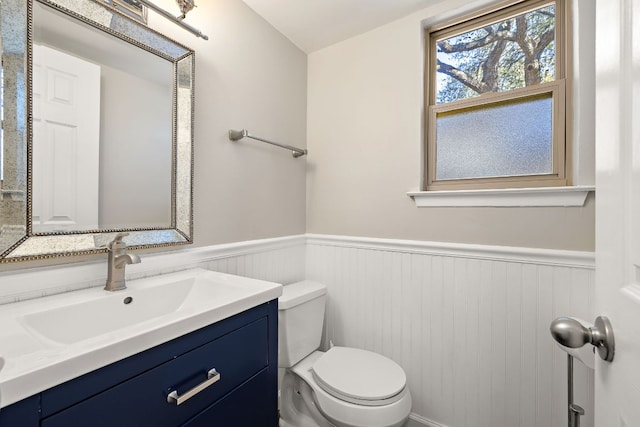 4910 Pelham Dr, Austin, TX 78727 - half bathroom featuring wainscoting and vanity