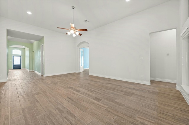 unfurnished room with ceiling fan and light hardwood / wood-style floors