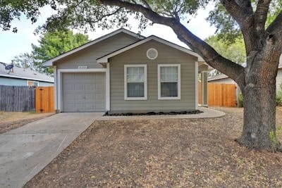 ranch-style house featuring a garage