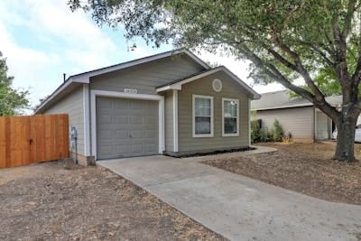 ranch-style house featuring a garage