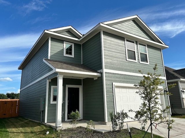 view of front of property featuring a garage