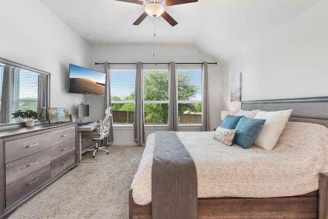 bedroom with ceiling fan, lofted ceiling, and light carpet