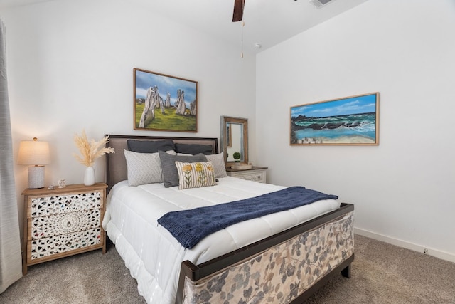 bedroom with carpet floors, ceiling fan, and baseboards