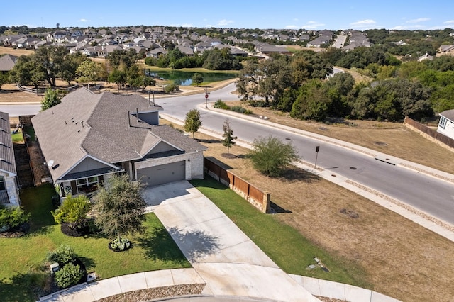 birds eye view of property with a residential view