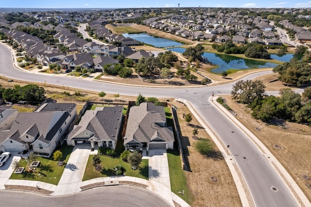 aerial view with a residential view and a water view