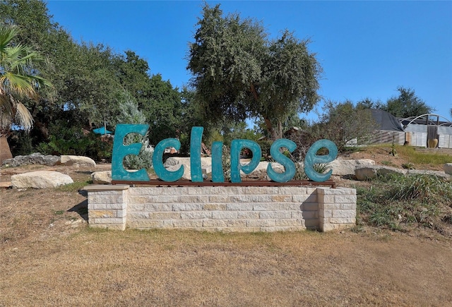 view of community sign