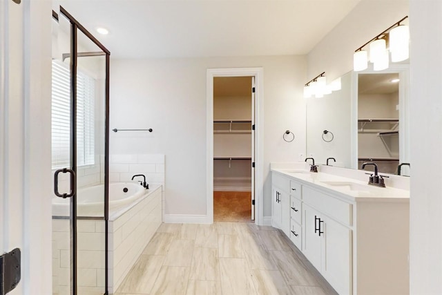 bathroom with plus walk in shower and vanity