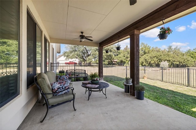 504 Pheasant Mdw, Liberty Hill, TX 78642 - fenced backyard with a ceiling fan and a patio