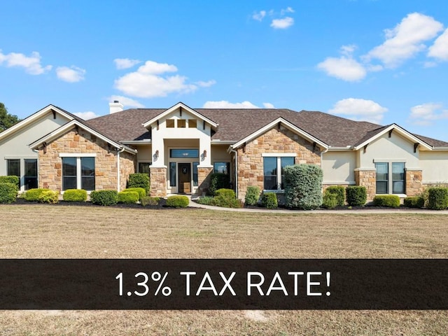 504 Pheasant Mdw, Liberty Hill, TX 78642 - craftsman-style home with stone siding and a front yard