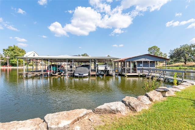 dock area featuring a water view and boat lift