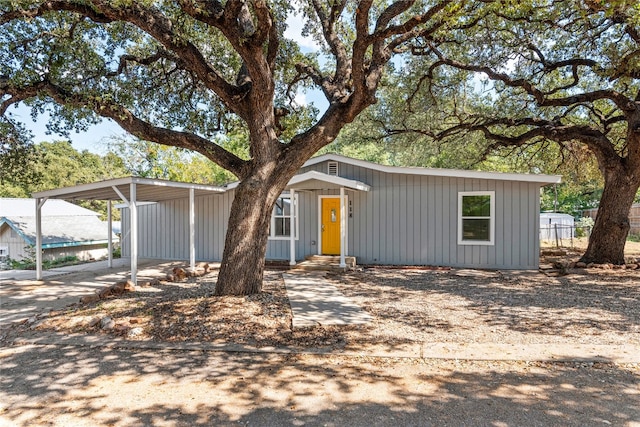 view of front of home featuring a carport