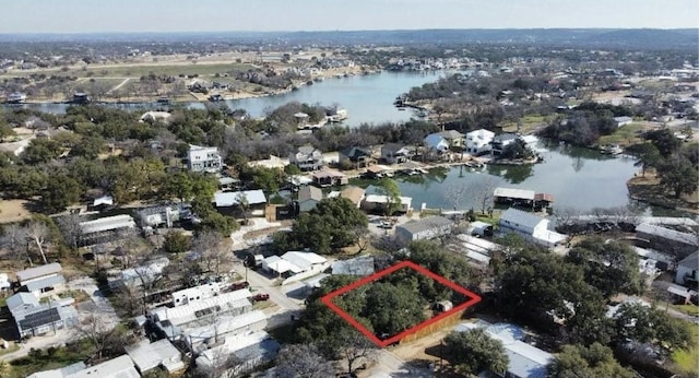 drone / aerial view featuring a water view