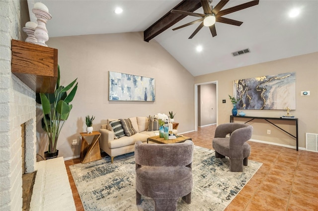 living room featuring ceiling fan, a fireplace, lofted ceiling with beams, and tile patterned flooring