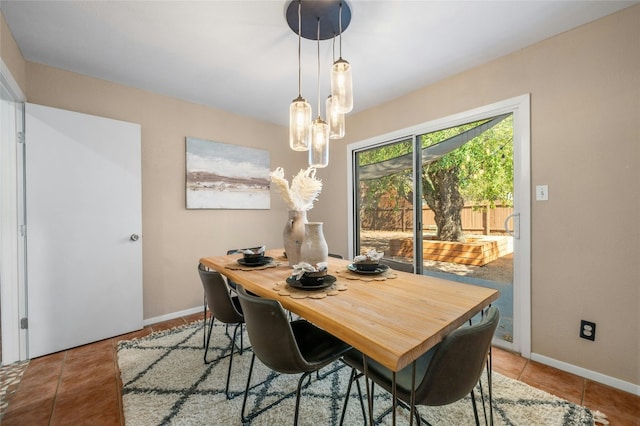 dining area with light tile patterned flooring