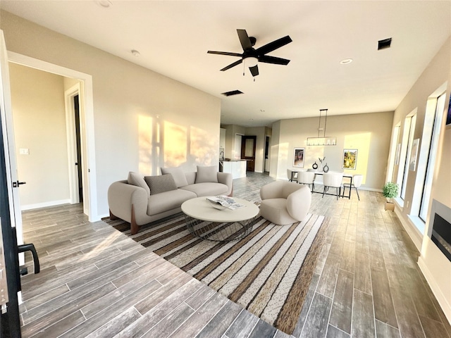 living room with ceiling fan