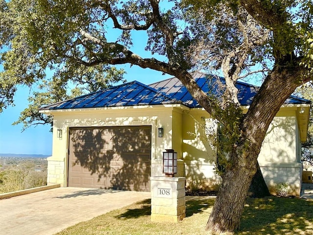 view of front of home with a garage