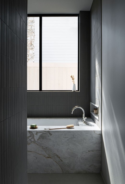 bathroom featuring a tub