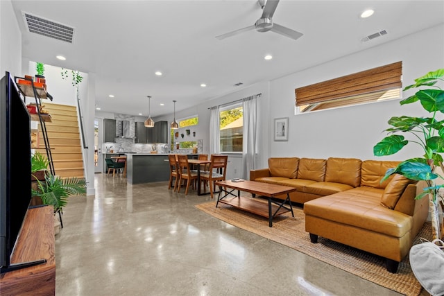 living room with ceiling fan