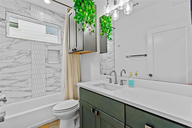 full bathroom featuring toilet, vanity, and shower / bathtub combination with curtain