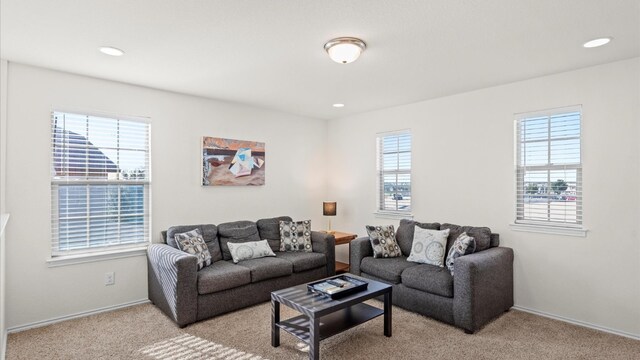 living room with light colored carpet