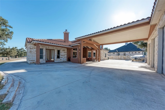 back of property featuring a patio area