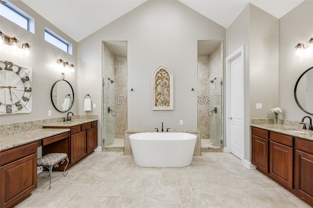 bathroom featuring vanity, independent shower and bath, and high vaulted ceiling