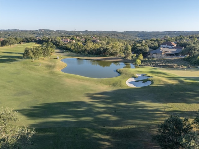 view of community with a water view