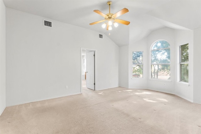 unfurnished room with light carpet, ceiling fan, and lofted ceiling