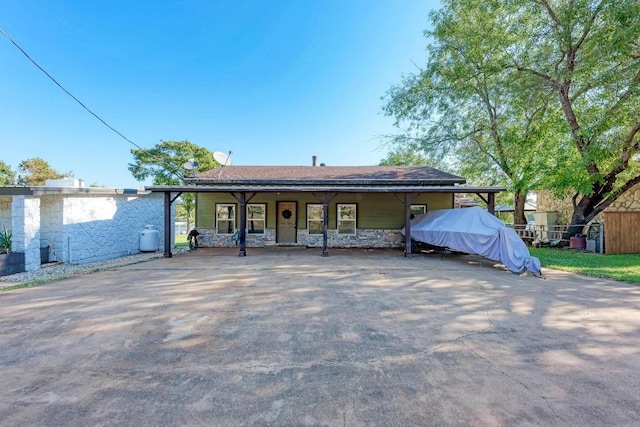 616 Sandy Harbor St, Horseshoe Bay, TX 78657 - view of front of property featuring a porch, stone siding, and roof with shingles