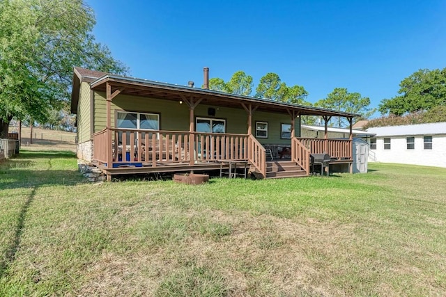 616 Sandy Harbor St, Horseshoe Bay, TX 78657 - rear view of house featuring a lawn