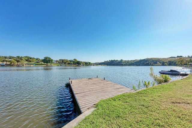 616 Sandy Harbor St, Horseshoe Bay, TX 78657 - dock area featuring a water view and a yard