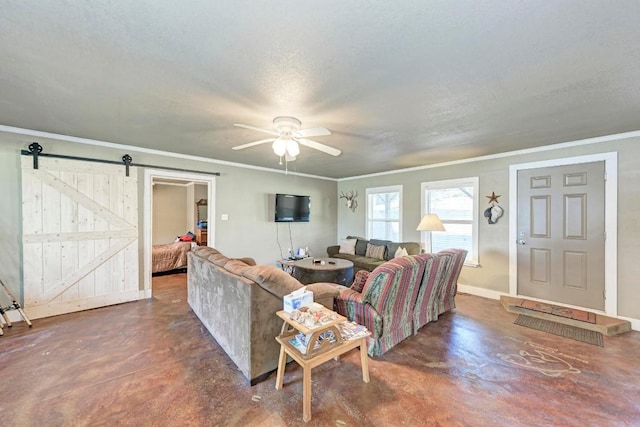 616 Sandy Harbor St, Horseshoe Bay, TX 78657 - living room with baseboards, finished concrete flooring, ceiling fan, and a barn door