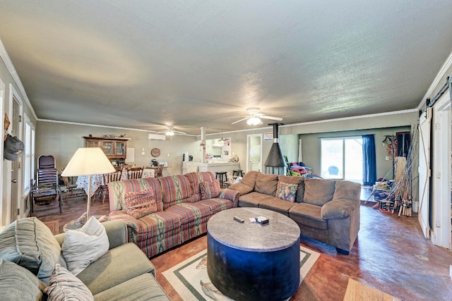 living room featuring crown molding, a textured ceiling, and ceiling fan