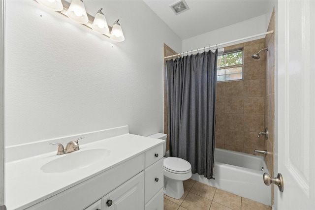 full bathroom featuring vanity, toilet, shower / bathtub combination with curtain, and tile patterned floors