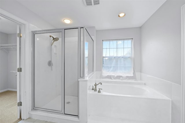 bathroom with independent shower and bath