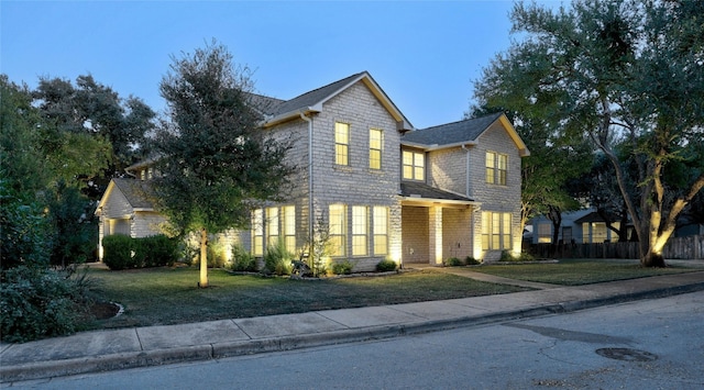 view of front property featuring a front yard