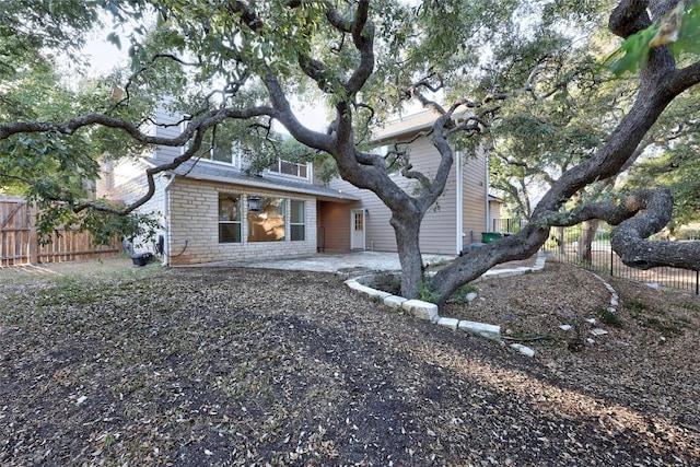 view of front of house featuring a patio area