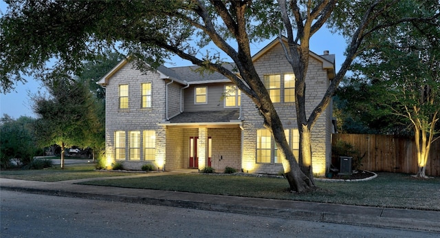 front facade featuring central AC unit