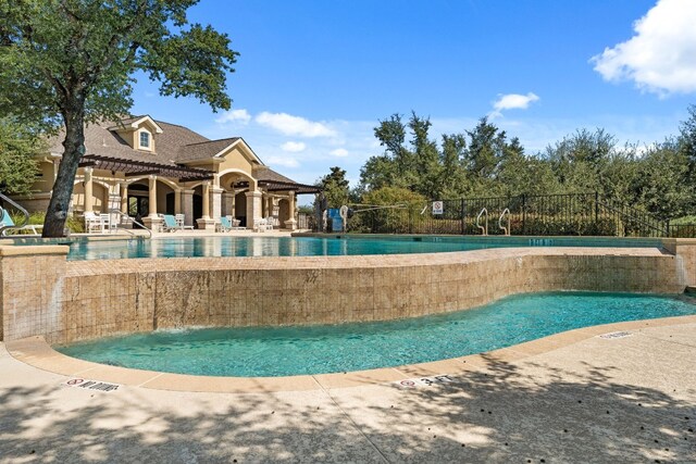 214 Darwins Way, Lakeway, TX 78734 - community pool with a patio area
