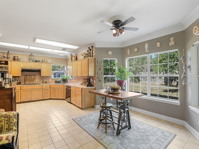 kitchen featuring ceiling fan, sink, crown molding, light brown cabinetry, and light tile patterned floors