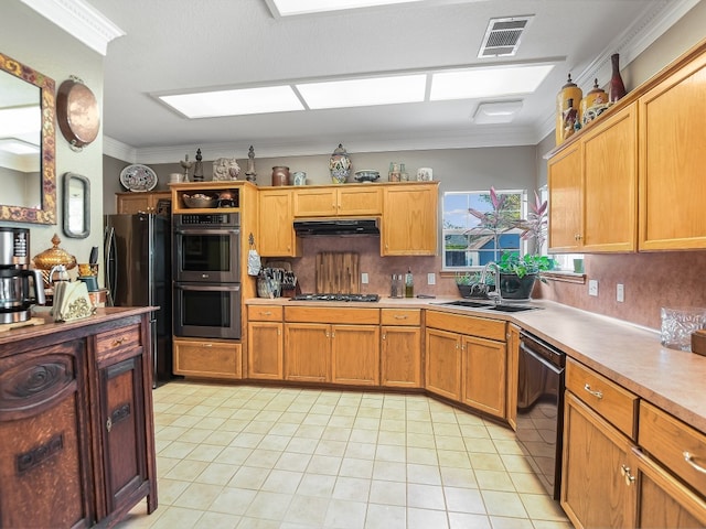 kitchen with light tile patterned flooring, sink, tasteful backsplash, black appliances, and crown molding