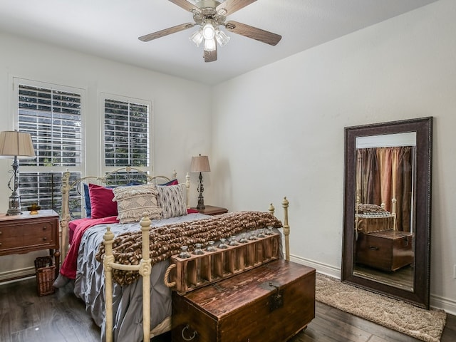 bedroom featuring dark wood-type flooring and ceiling fan