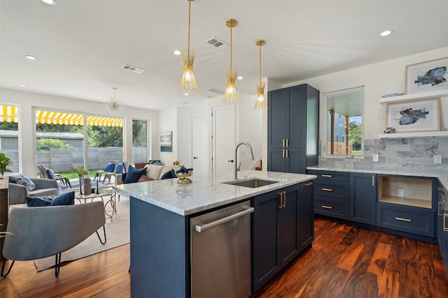 kitchen featuring plenty of natural light, sink, and dark hardwood / wood-style floors