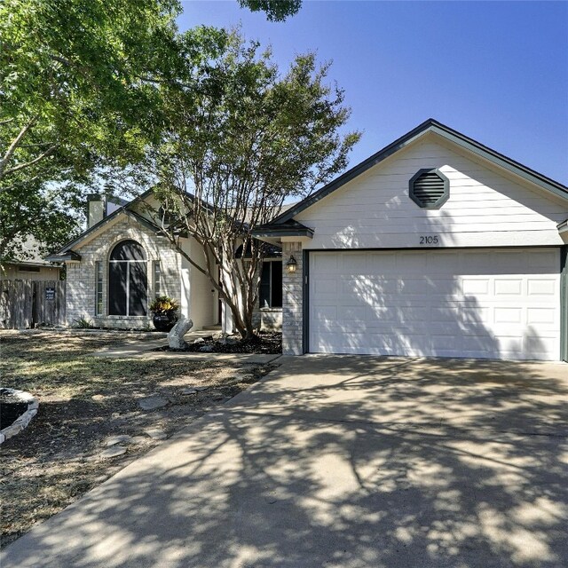 single story home with a garage