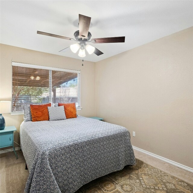 bedroom featuring carpet floors and ceiling fan