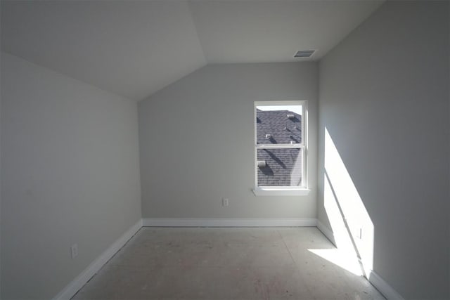 additional living space with vaulted ceiling