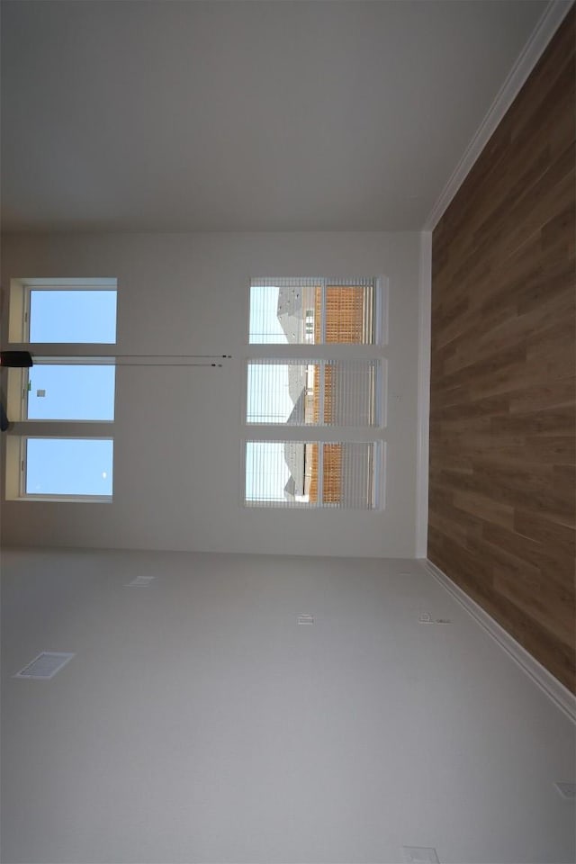 empty room with wooden walls