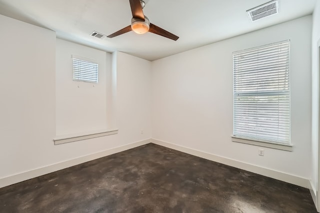 empty room featuring ceiling fan