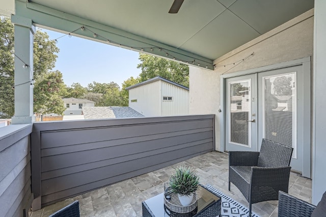 view of patio featuring a balcony