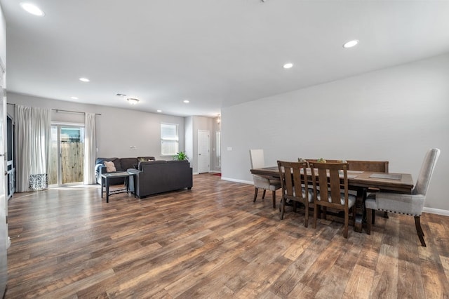 dining area with dark wood-type flooring